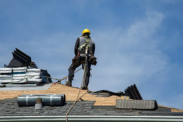 Professional Roofing technician working in La Fargeville, NY